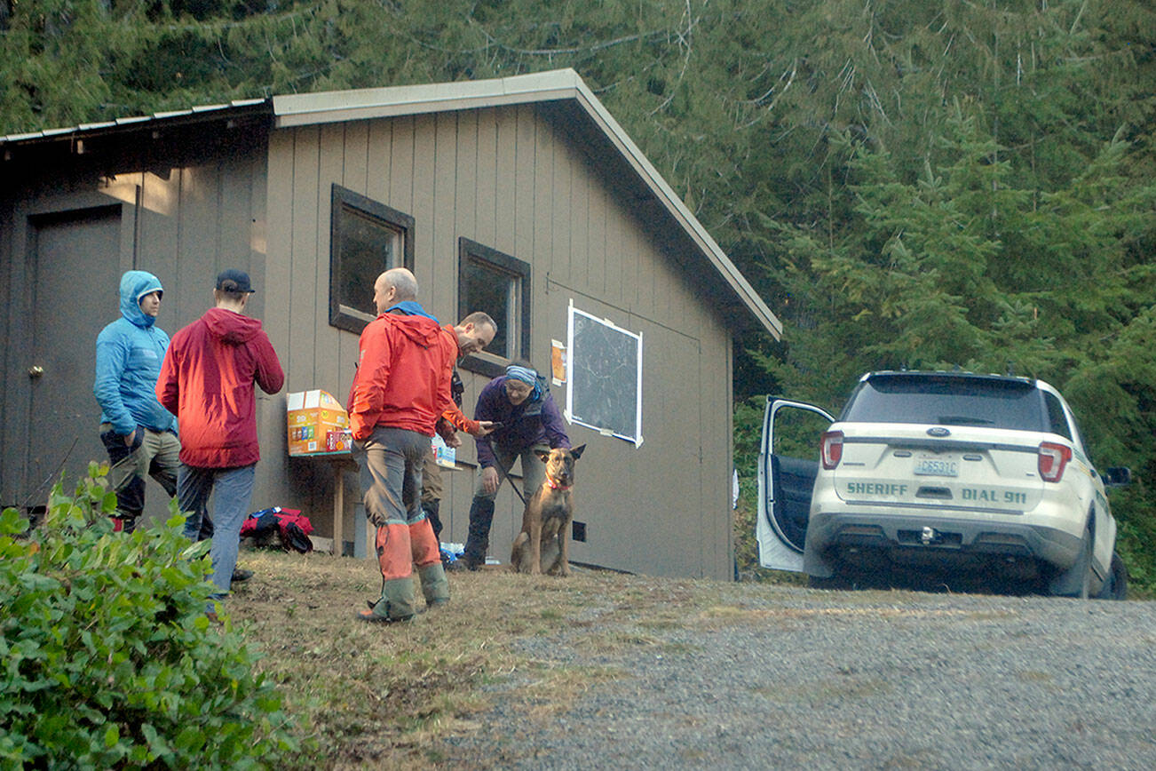 Keith Thorpe/Peninsula Daily News
Search and rescue personnel stage at the home of Isaac Rivas in the 1600 block of Dan Kelly Road east of Port Angeles on Saturday, not far from where the 73-year-old man was located after going missing on Thursday.