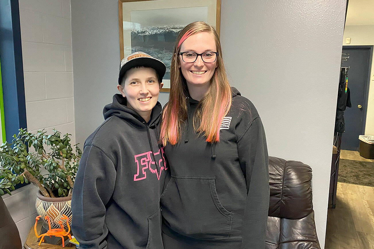 PHOTO BY: Vivian Hansen/Peninsula Daily News

CAPTION : Brittany Baker, on left, and Carly Baker are the new owners of Rudy's Automotive in Port Angeles.