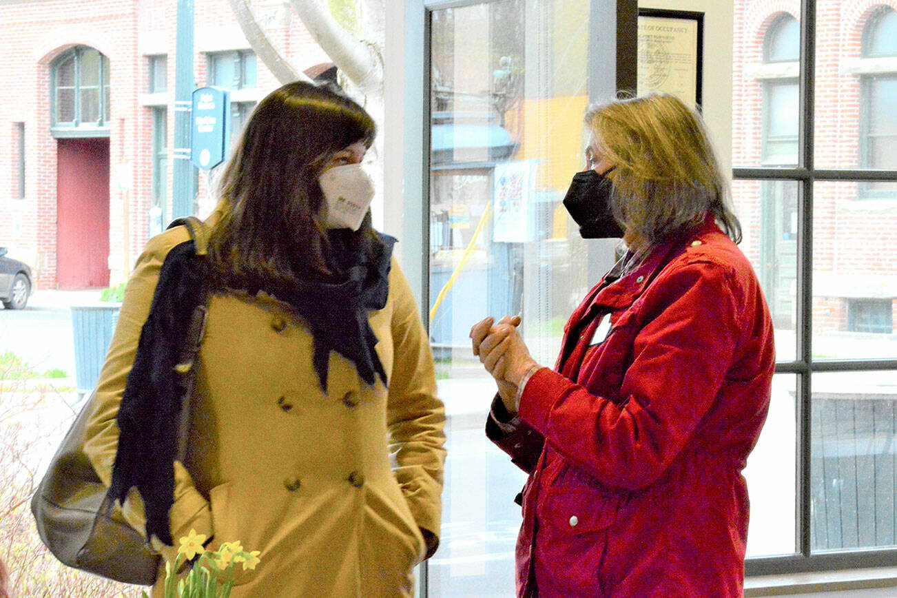 Port Townsend School District Superintendent Linda Rosenbury, left, and Main Street Program Executive Director Mari Mullen were among the people who came to the city’s streateries-and-parklets open house at the Cotton Building on Tuesday. (Diane Urbani de la Paz/Peninsula Daily News)