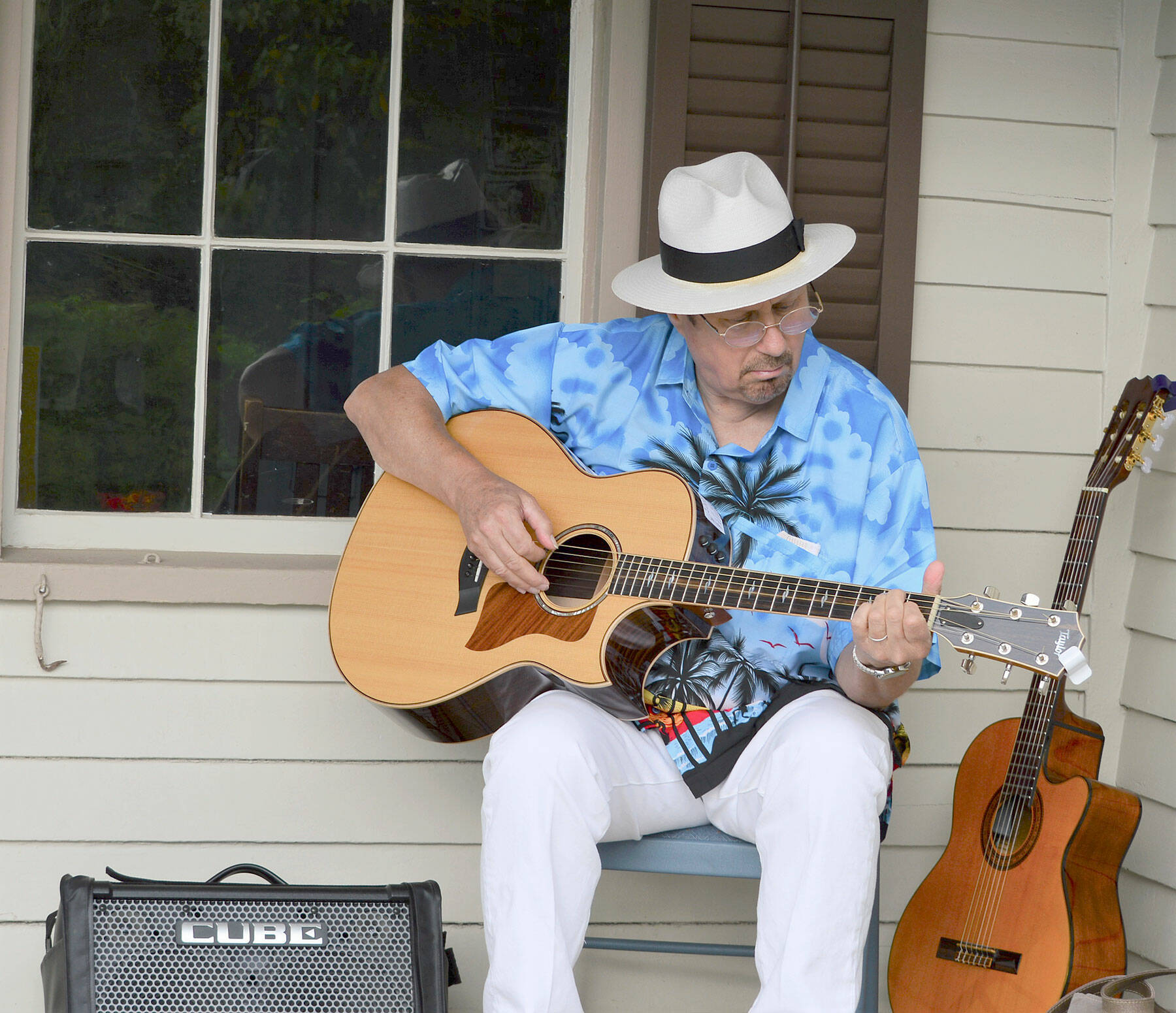 Chicago Bob Longmire, pictured playing solo at the Rothschild House last summer, will bring the Midnight Train Blues Band to Port Townsend’s Discovery Bay Brewing Co. for the monthly blues jam starting Sunday. (Diane Urbani de la Paz/Peninsula Daily News)