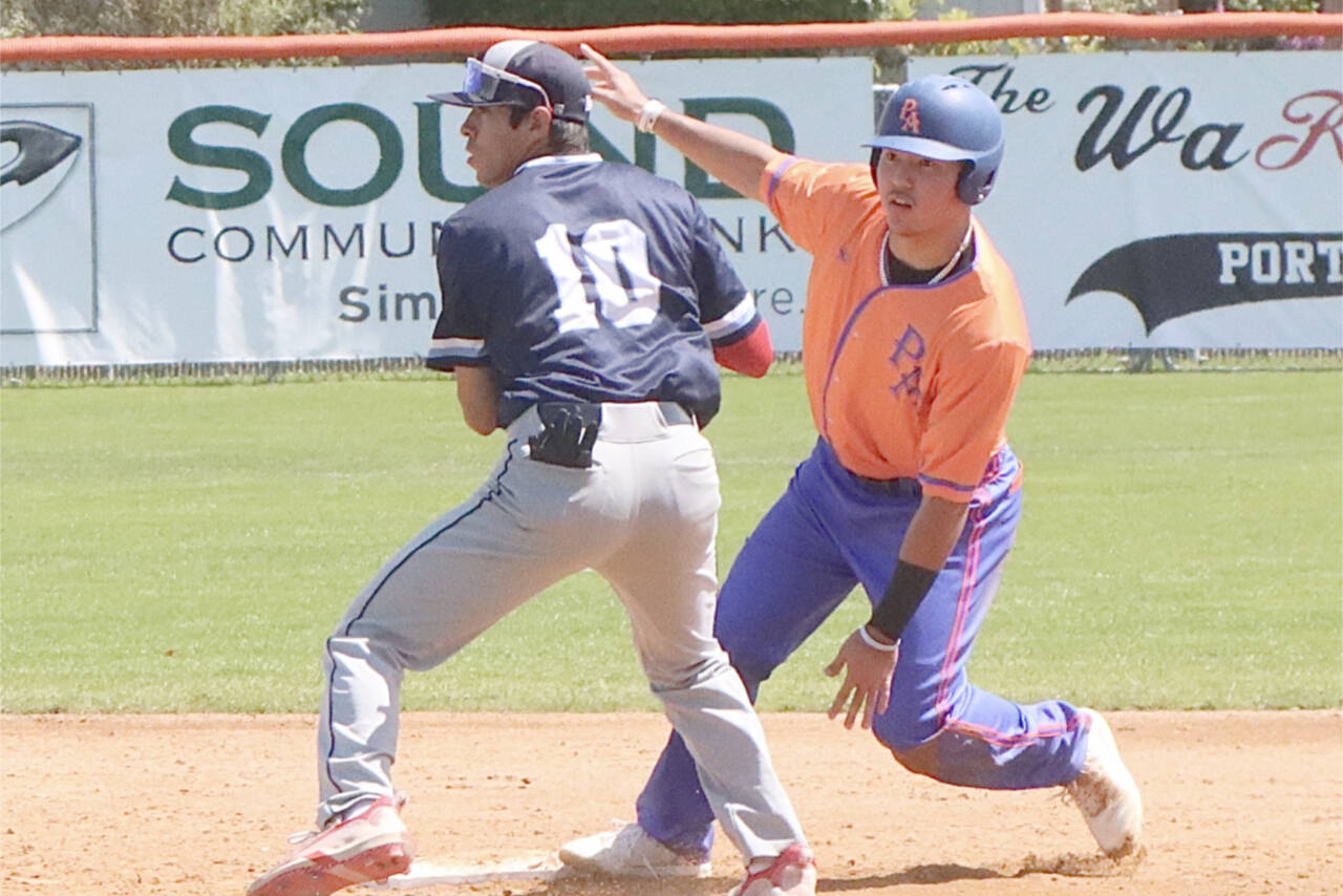 The Lefties' Jadon Arakaki is safe at second base as Bellingham Bells shortstop Christopher Campos is late with the throw and tag. (Dave Logan/for Peninsula Daily News)