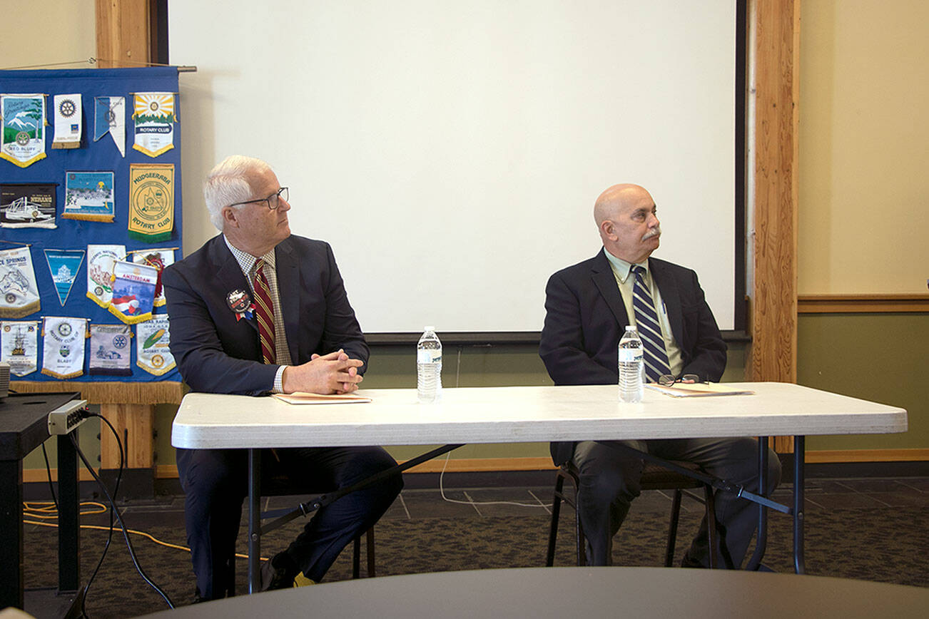 Jefferson County Sheriff candidates Detective Art Frank, left, and Sheriff Joe Nole debate. (Ken Park/Peninsula Daily News)