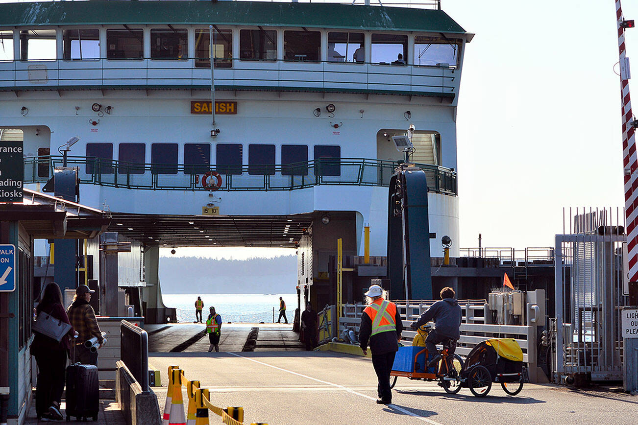 The M/V Salish, at the Port Townsend dock Thursday morning, is one of the 21 Washington State Ferries to have their names changed to celebrate the Seattle Mariners. The Salish, as long as the team stays in postseason play, will be renamed after Mariners pitcher Andres Muñoz. (Diane Urbani de la Paz/For Peninsula Daily News)
