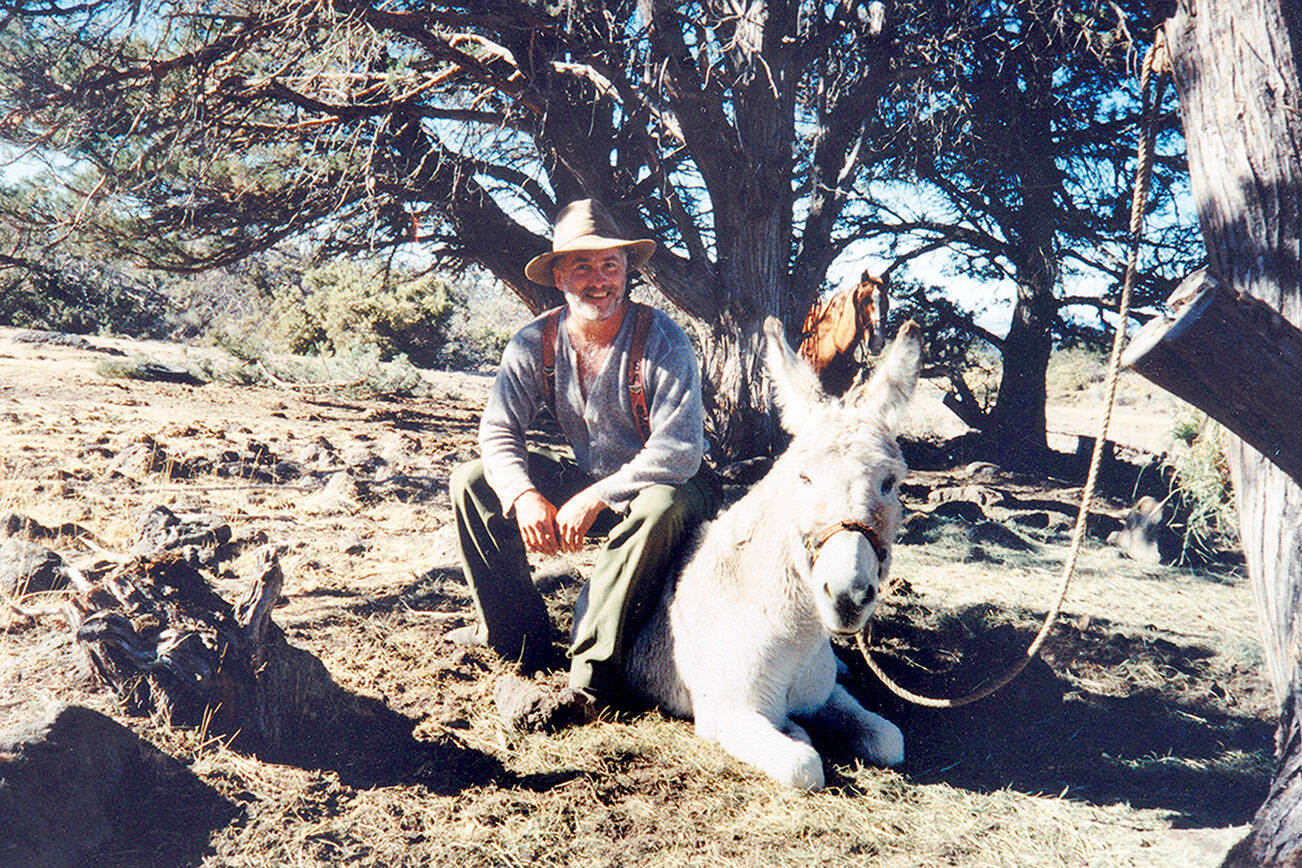 Bo, (Bob Neal) was my cousin and a father, grandfather, husband, logger, builder and a hunter that we shared many adventures with. He is gone long before his time and I and his family would appreciate it if you could run a picture of him with Milton the Burrow.