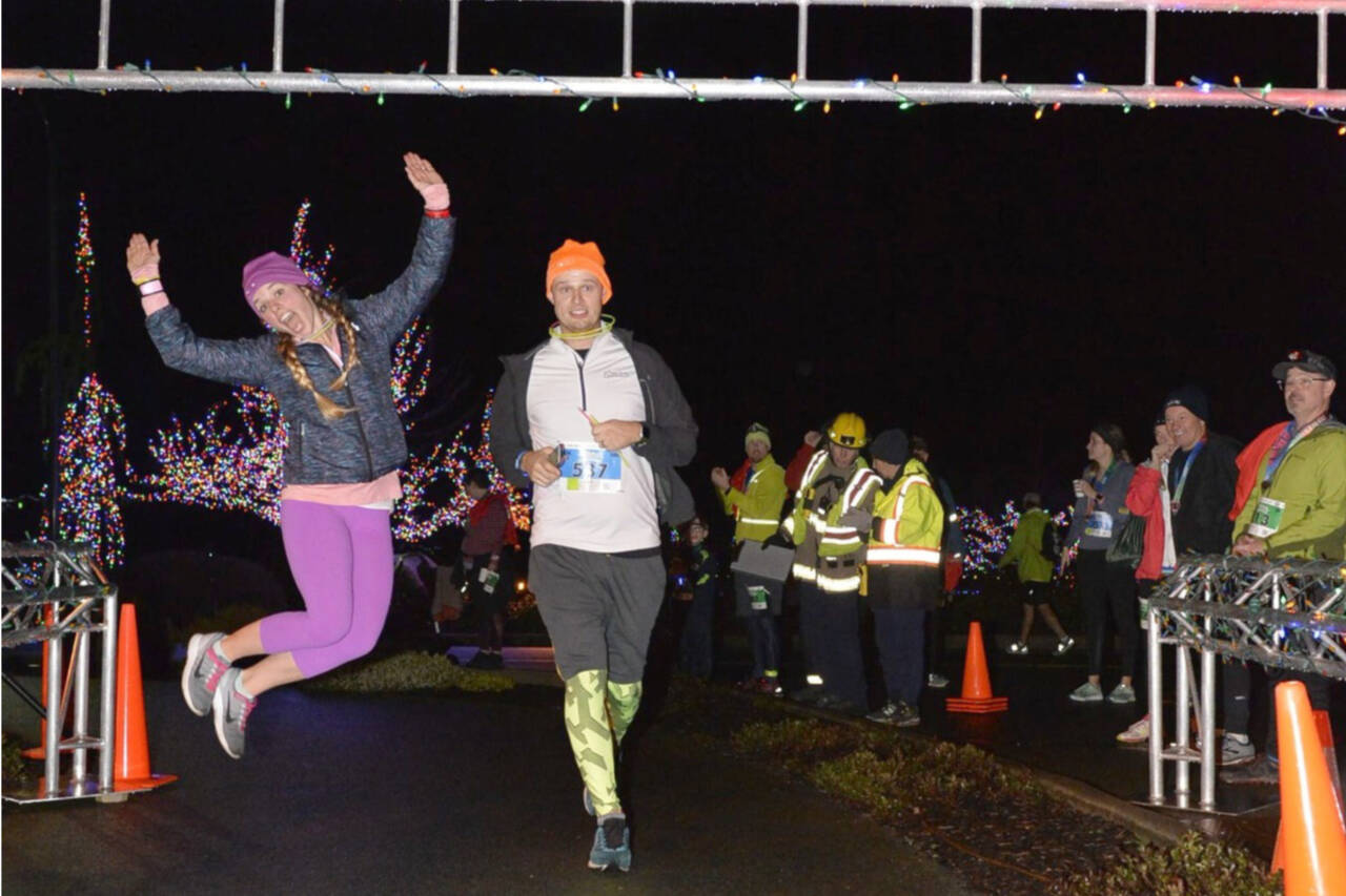 Photo courtesy of Run the Peninsula
Runners cross the finish line in the December 2021 Jamestown S'Klallam 5K/10K held in Blyn.
