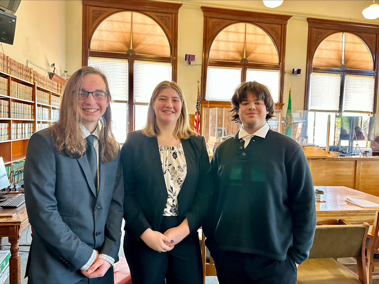 Sequim High’s Mock Trial club members include, from left, Brody Anderson, Ameila Pozernick and Finn Marlow.