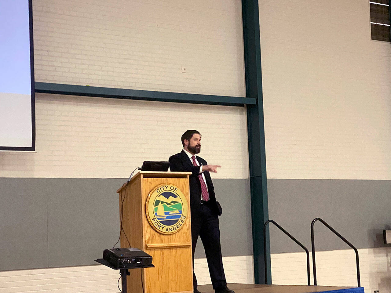 Nathan West, Port Angeles city manager, gives his annual State of the City address at a meeting of the Port Angeles Chamber of Commerce on Wednesday. (Ken Park/Peninsula Daily News)