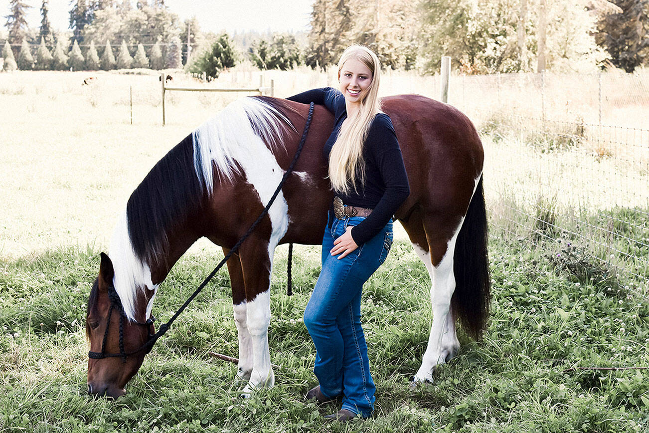 Photos by Anna Swanberg

Cutline: Teen mustang trainers Libby Swanberg (with Latte) and her sister Asha Swanberg, each broke the record for the attaining the highest selling prices ever — more than $10,000 each — earlier this month at the Mustang Yearlings/Washington Youth auction in Cle Elum.
