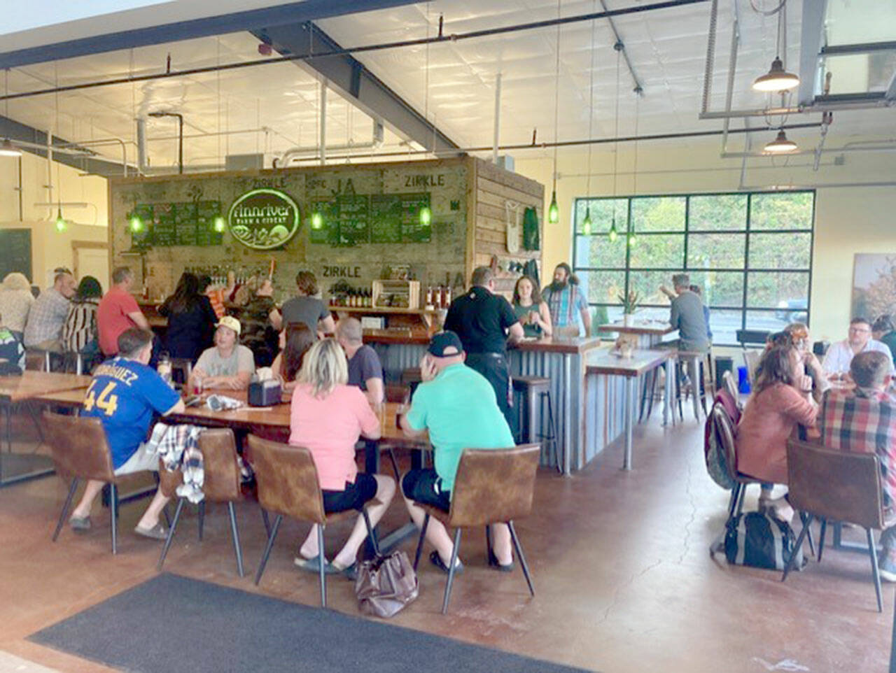 Finnriver Farm and Cidery has opened a new taproom in the craft district of Tumwater.