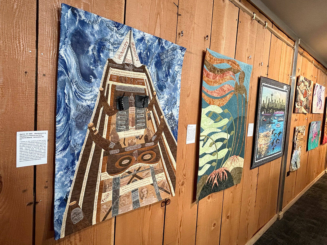 “Against all Odds: Abandonment to Olympian, A Tribute to Joe Rantz” by Catherine Bilyard is one of 41 quilts on display in Sequim Museum & Arts through the end of March as part of the “Inspiration/Exploration” exhibit. (Matthew Nash/Olympic Peninsula News Group)