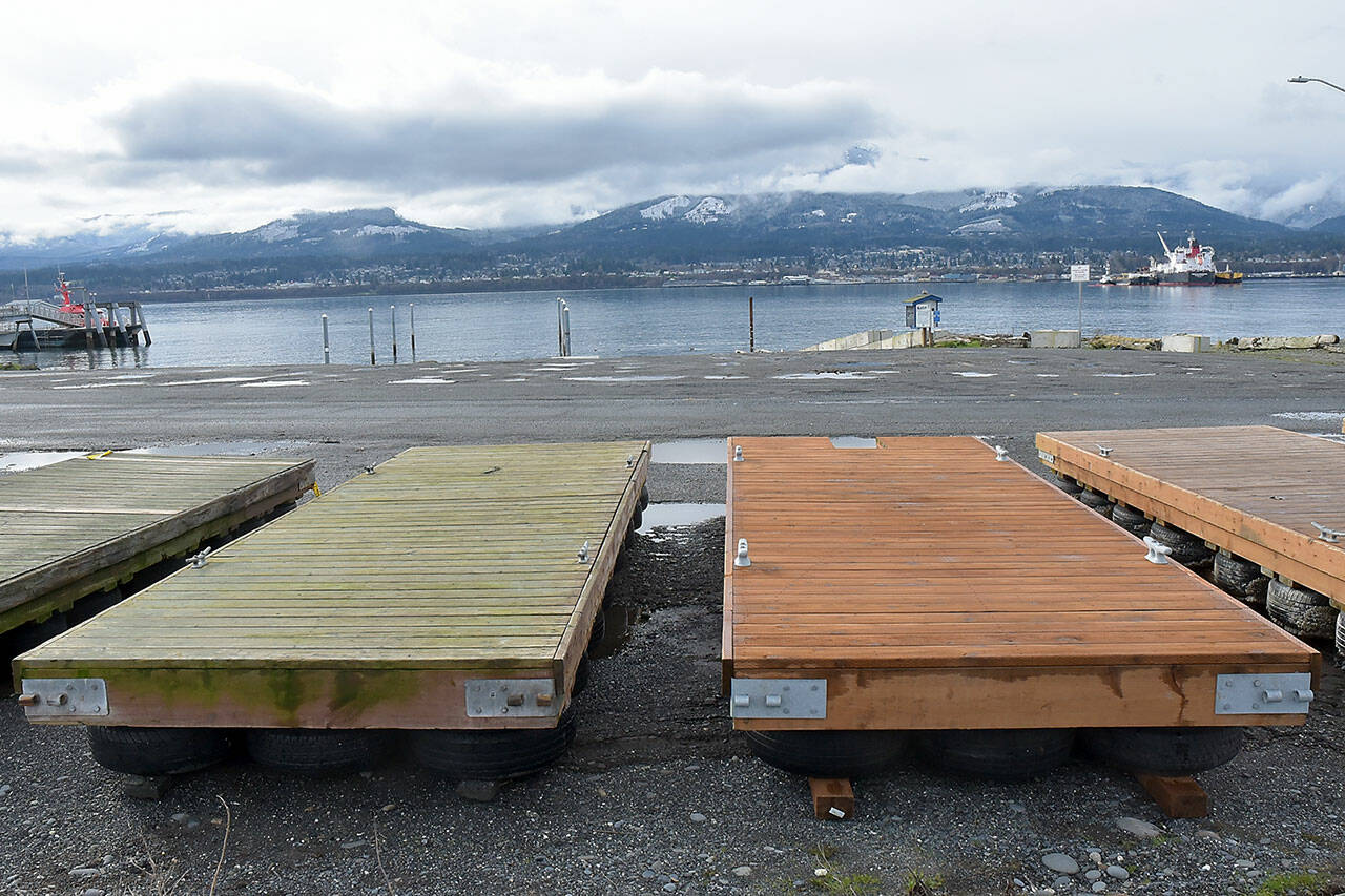 KEITH THORPE/PENINSULA DAILY NEWS Floats for the City of Port Angeles’ boat launch on Ediz Hook sit on the ground near the launch on Friday after they were removed to prevent storm damage.