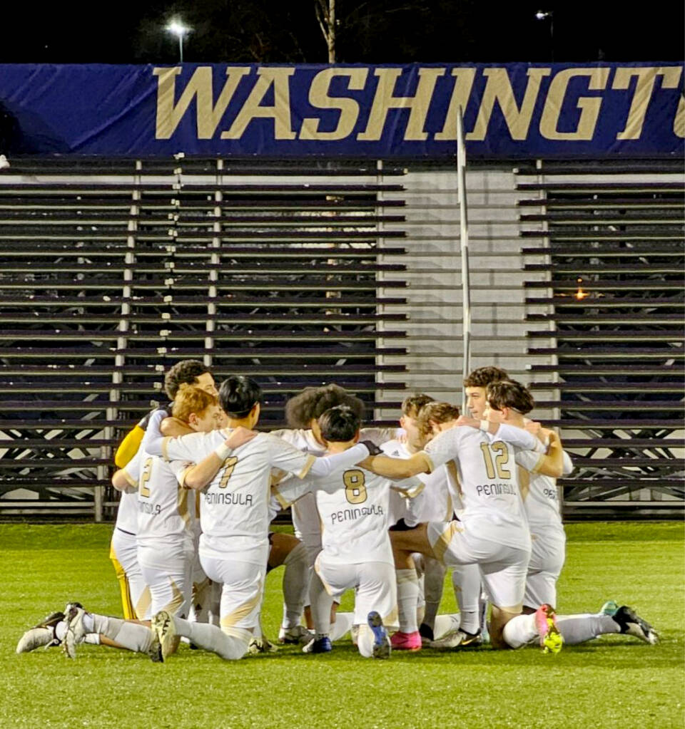 The defending NWAC champion Peninsula College men’s soccer team meets before playing a scrimmage against the Washington Huskies on Sunday. (Peninsula College)