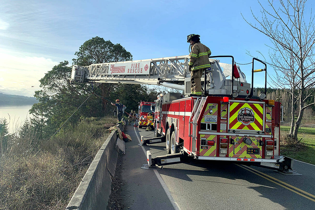 Members of East Jefferson Fire-Rescue rescued an injured driver who was ejected from their vehicle when it went over a cliff on South Discovery Road on Wednesday. (East Jefferson Fire Rescue)