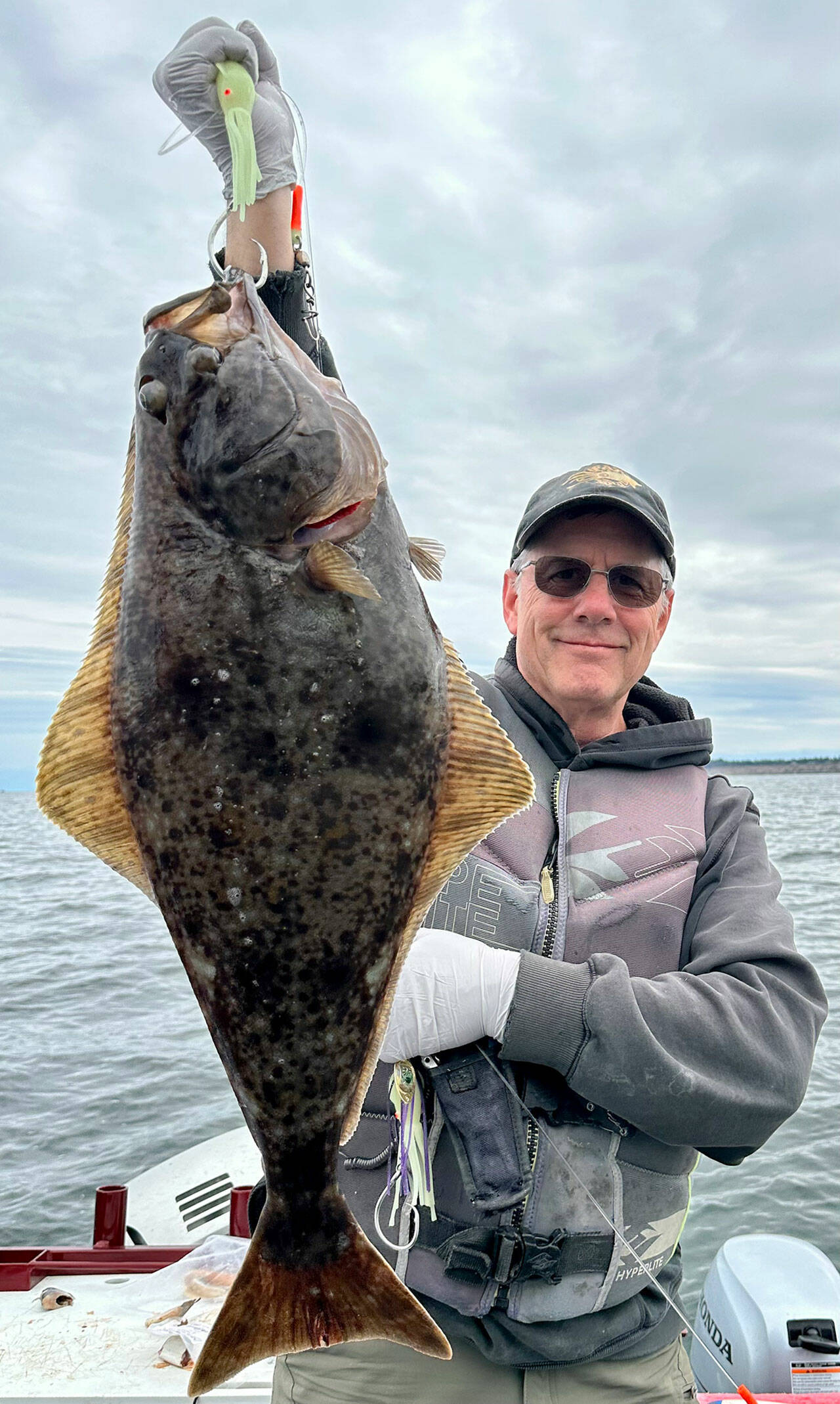 John Beath Halibut angler John Beath, operator of SquidPro Charters, caught this halibut while fishing off Port Angeles with some buddies on opening day of halibut season Thursday.