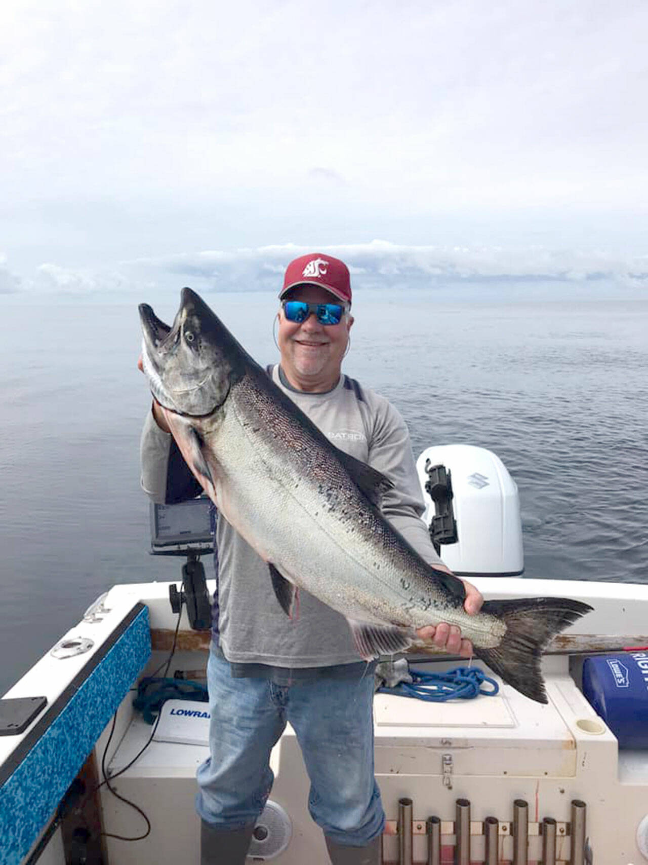 For Outdoors-PDN-240412 Dave Johnson caught this chinook while fishing off of Neah Bay. The Pacific Fishery Management Council adopted ocean salmon season recommendations on Wednesday.