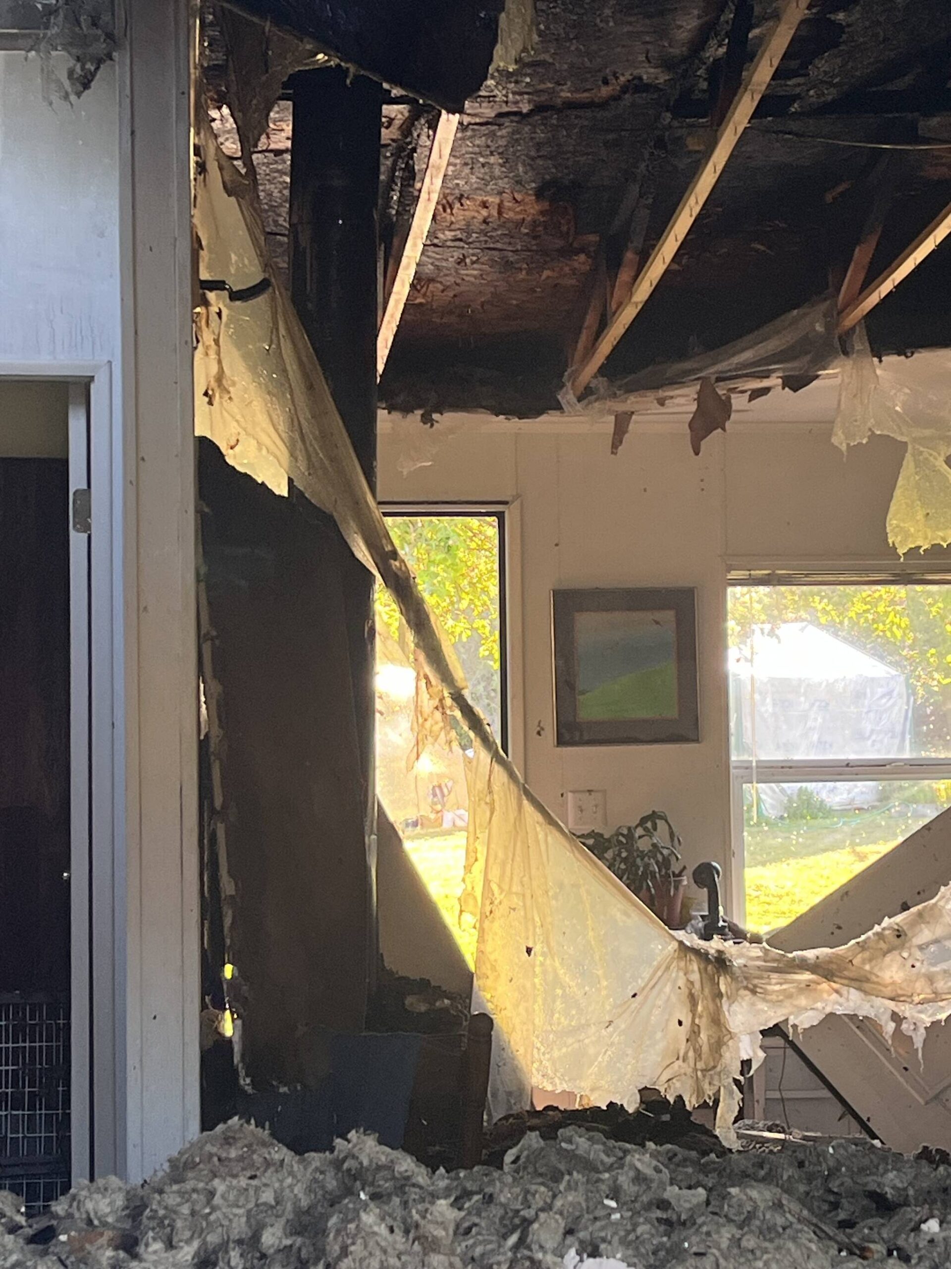 Firefighters from Clallam County Fire District 3 fought a fire on Friday that damaged a manufactured home in Sequim. (Elliott Jones/Clallam County Fire District 3)