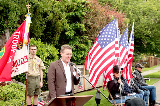 Lt. Comm. (Ret.) Doug Adams of the U.S. Navy served as the keynote speaker on Monday during the annual Memorial Day service at Captain Joseph House in Port Angeles. Adams, who now lives in Seattle, was at the same base in Afghanistan on May 29, 2011, when Capt. Joseph Schultz and others were killed. About 75 people attended the ceremony, which included a ceremony for Logan Hall, who died on July 13, 2018. His sister, Savannah Giddings, laid a special wreath to honor him. (Dave Logan/for Peninsula Daily News)