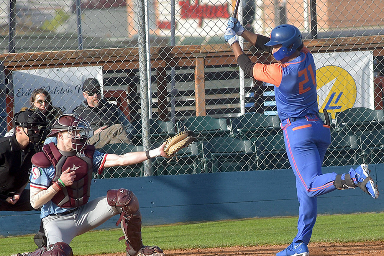 KEITH THORPE/PENINSULA DAILY NEWS
Lefties batter Roberto Garza Núñez, right, is nearly struck by an errant pitch as Wenatchee catcher Joe Scheffler receives the delivery on Wednesday in Port Angeles.