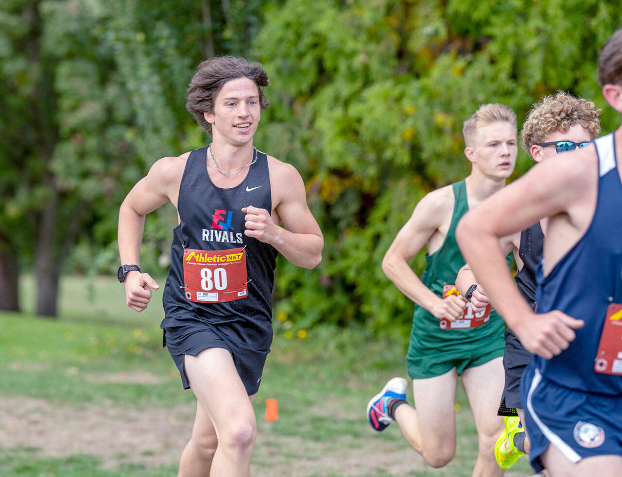 East Jefferson sophomore Josh Yearian, (80), looks relaxed as he runs uphill while in a Nisqually Leaguel cross-country meet on Tuesday at Camas Prairie Park Golf Club. Yearian finished sixth among the boys. (Steve Mullensky/for Peninsula Daily News)