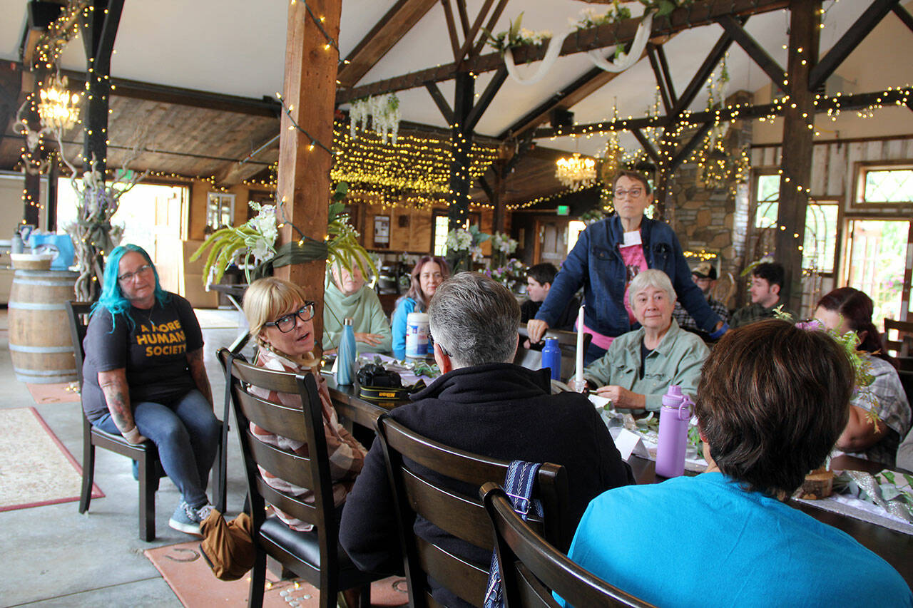Rainshadow Equine Sanctuary Team President Deb Pavlich-Boaz leads a meeting with animal advocates about forming a network to help each other address issues and find solutions together. (Karen Griffiths/For Peninsula Daily News)