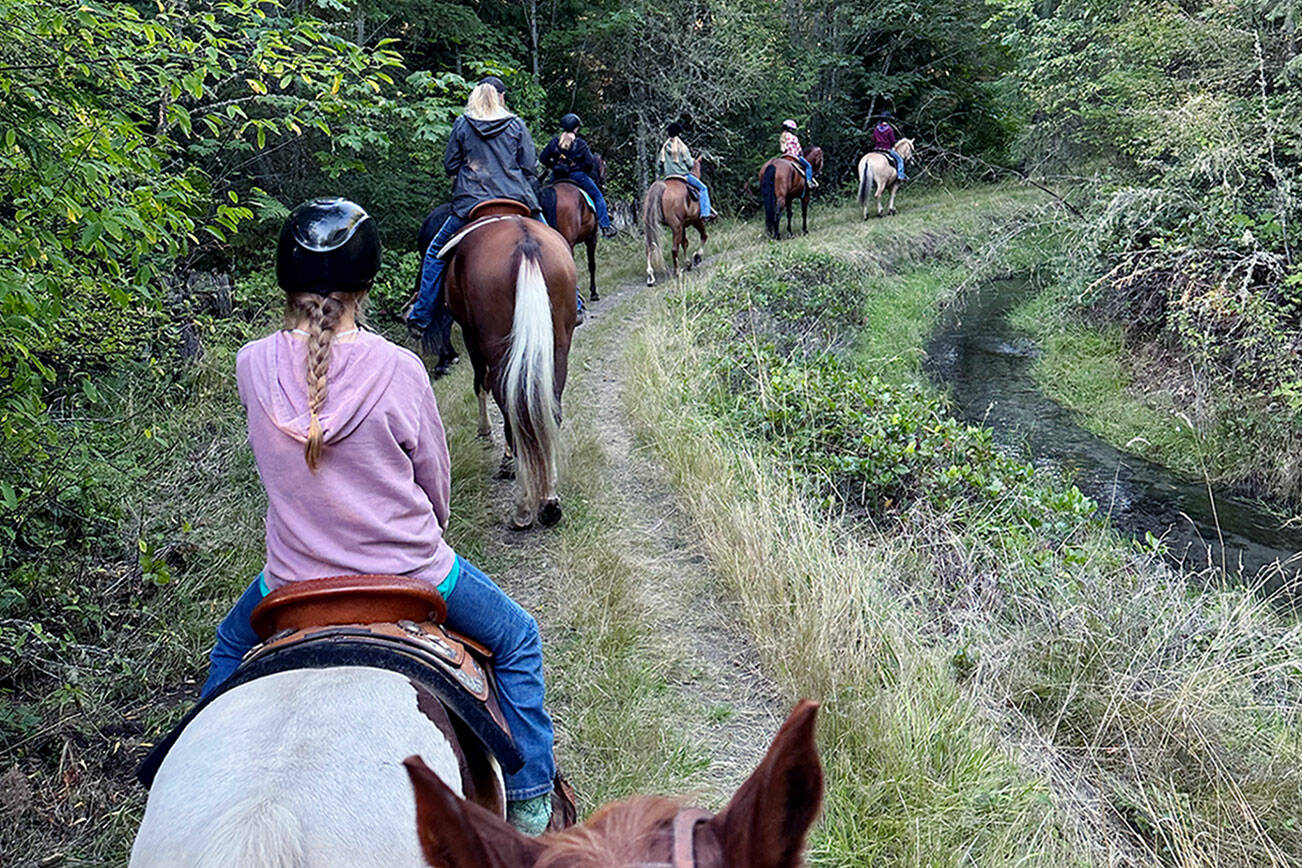 (This photo for online please)

Cutline: After a group lesson in Leader Katie Salmon’s horse area, members of Neon Riders 4-H club enjoyed an end-of-summer ride through Dungeness Trails, which has more than 10 miles of trails, and is located off River Road in Sequim.