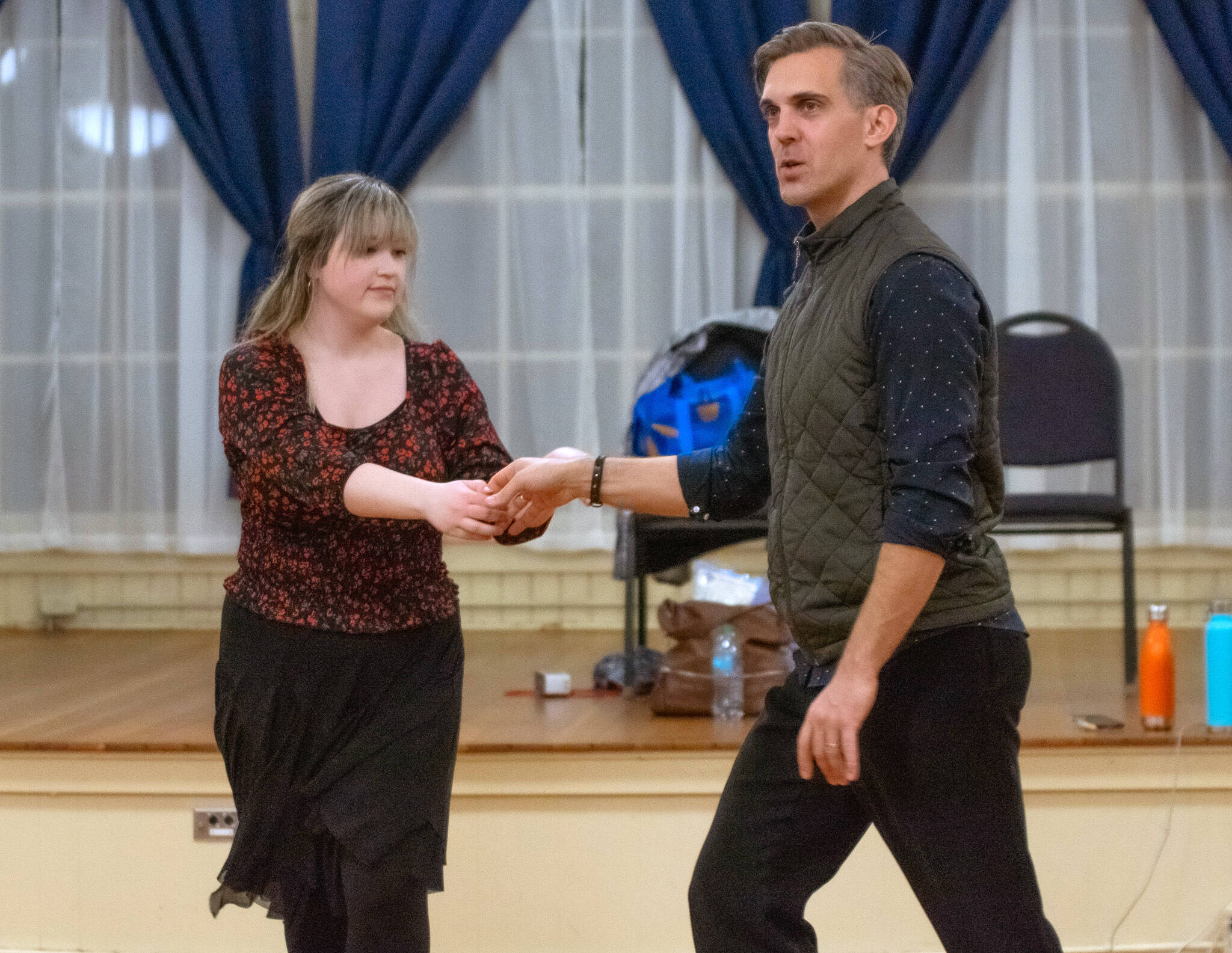 Emily Matthiessen/Olympic Peninsula News Group
Sequim Ballroom intern Brie Rocha follows instructor Werner Figar’s lead as he keeps an eye on his intermediate/advanced swing class.
