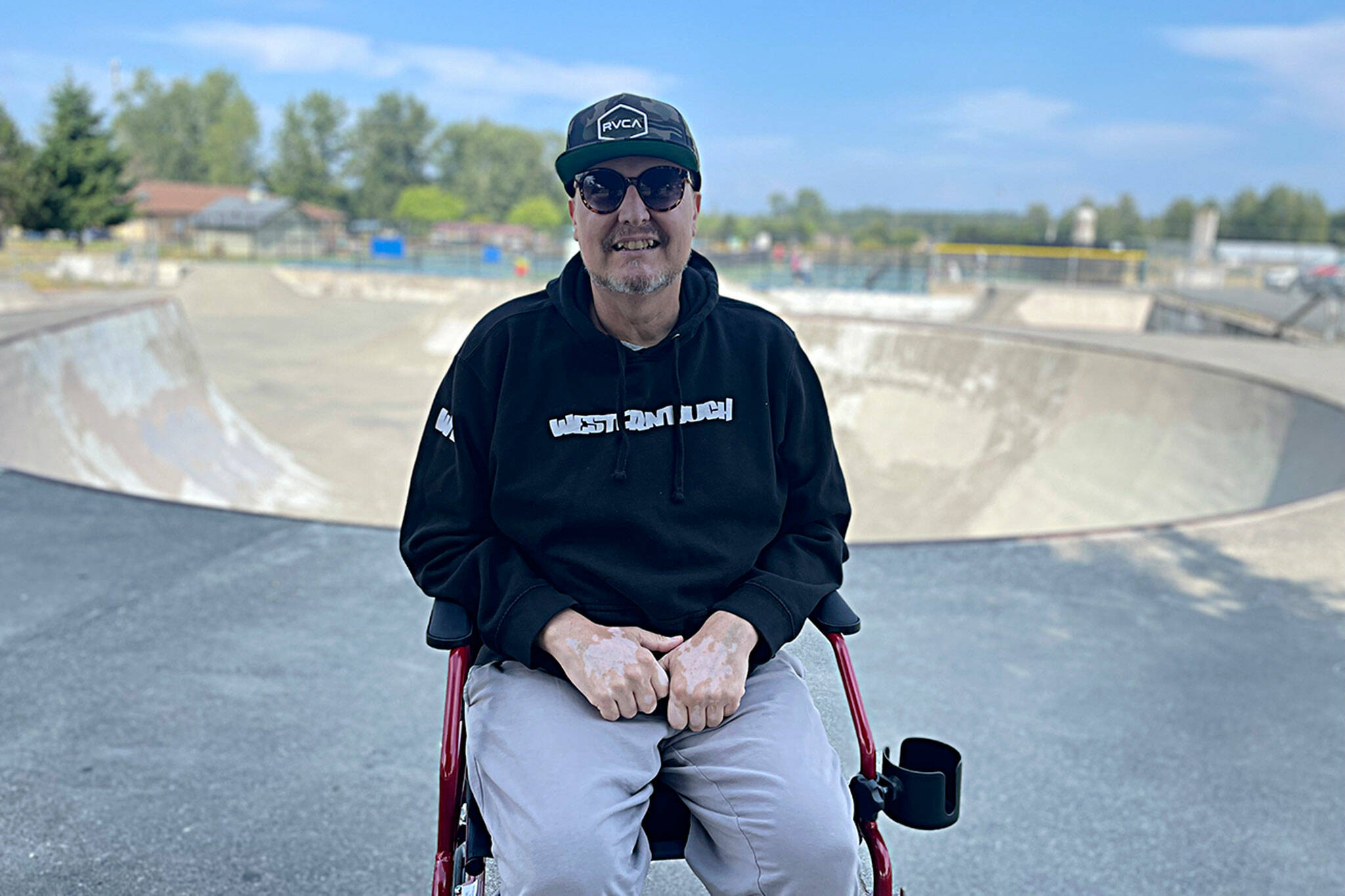 Mark Simpson sits atop the Sequim Skate Park in July 2023 where he had skated for years and advocated for its expansion. Community members rallied to support him and his family through the next year as he battled cancer. He died in April 2024. Sequim Mayor Brandon Janisse has proposed naming the skate park after him for his years of dedication to skating, the park and children. (Matthew Nash/Olympic Peninsula News Group, file)