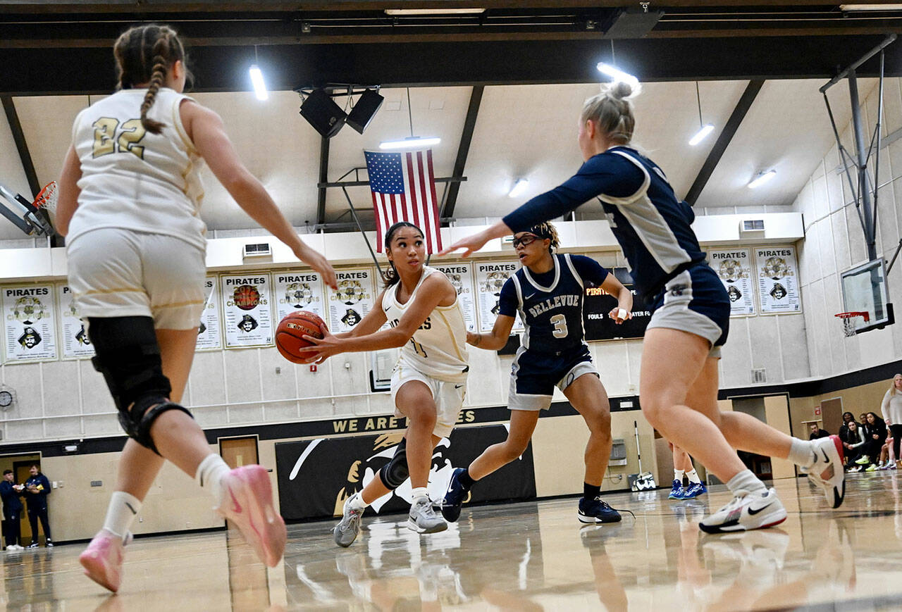 Jay Cline/Peninsula College Athletics Peninsula College’s Carliese O’Brien drives the lane during the Pirates’ 63-41 NWAC North Division victory over the Bellevue Bulldogs. Teammate Makena Patrick is at left.