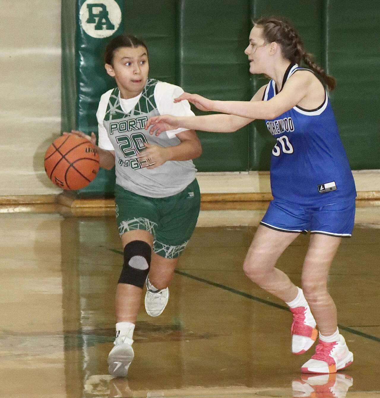 The Presidents’ Day Basketball Youth Tournament was held this weekend in Port Angeles with 40 teams coming from as far away as Elma, Sedro-Woolley, Belfair and Forks. Boys and girls teams had players in grades four through eight. Here, KaLeah Quilt of the seventh-grade Port Angeles girls team dribbles up the court against Shorewood. Shorewood won 22-21 on a last-second shot. (Dave Logan/for Peninsula Daily News)