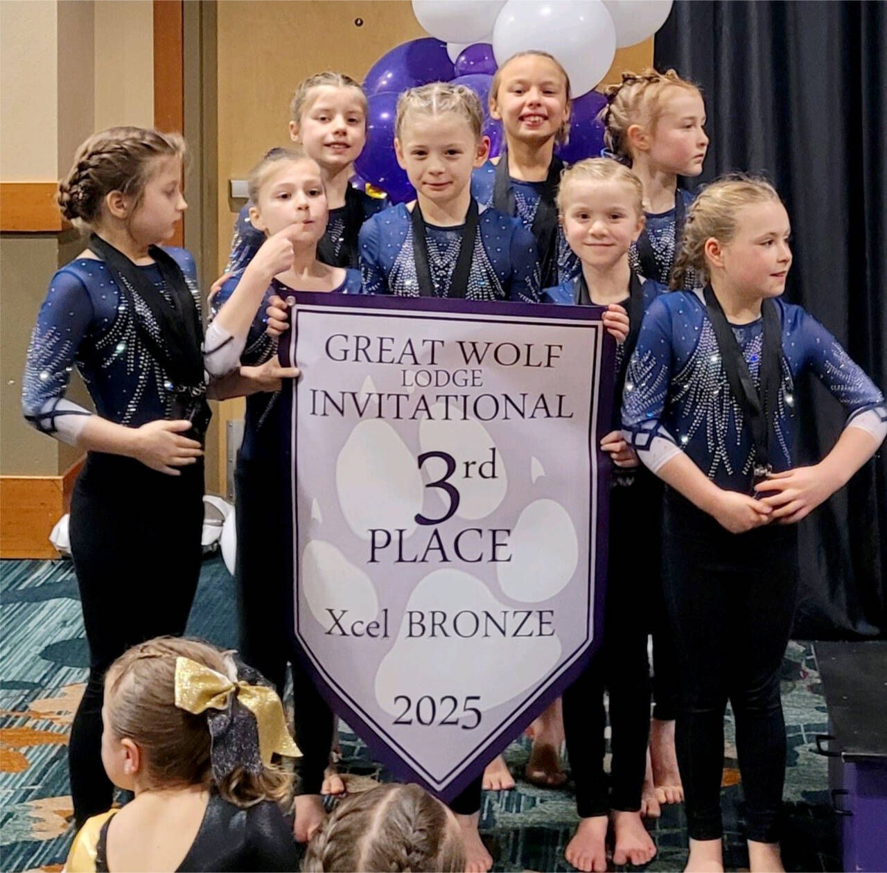 The Klahhane Xcel bronze team of Nora Pecoraro, Addie Brown, Kinley Matthews, Lucy Monaghan, Adrie McGuire, Sasha Gmazel, Penny Goodwin and Reagan Haguewood finished third this weekend at the Great Wolf Lodge Invitational in Chehalis. (Klahhane Gymnastics)
