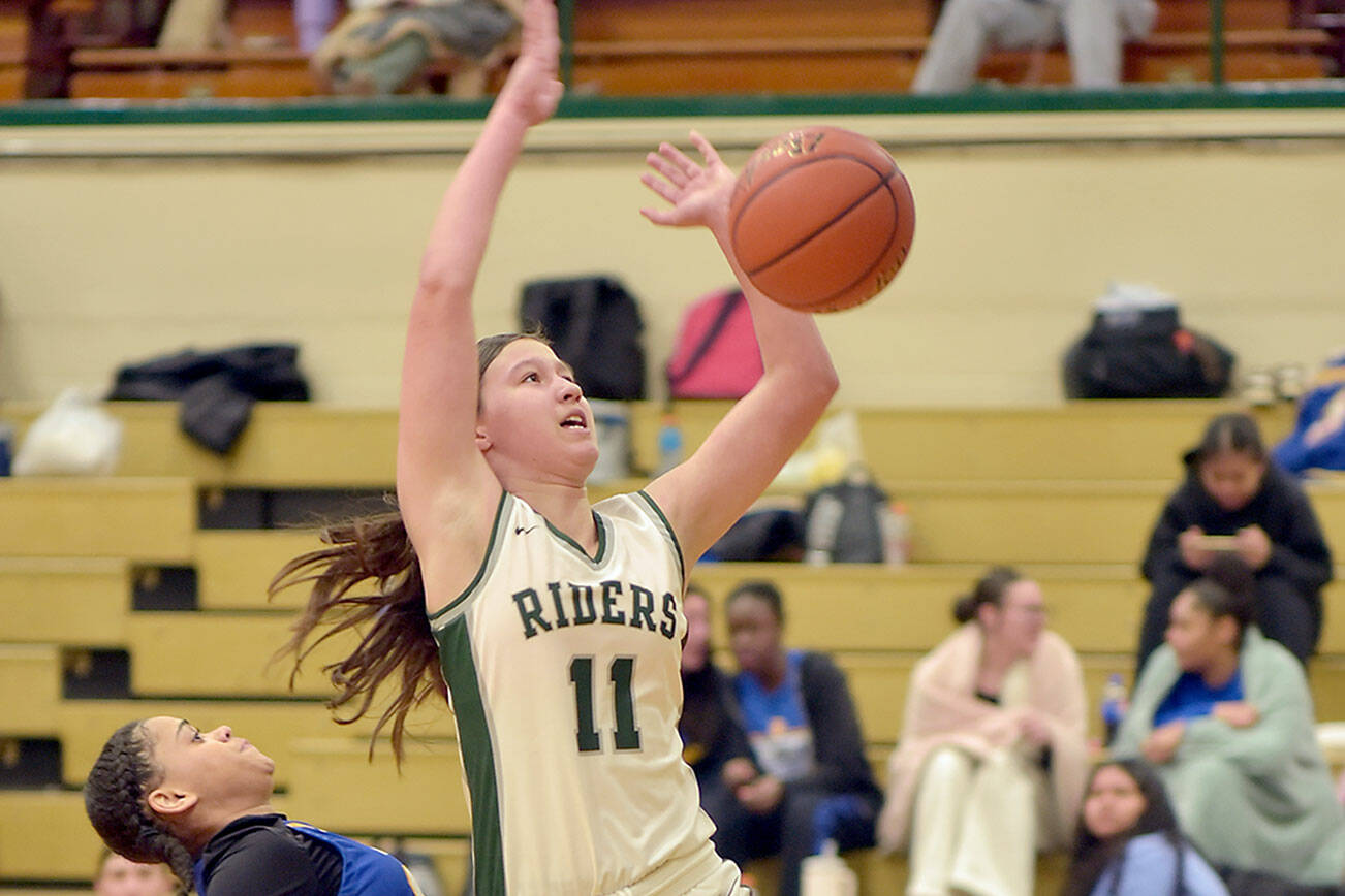 Port Angeles’ Lindsay Smith, here playing against Bremerton, is leading the Roughriders in scoring this season. Smith and her teammates begin play at the Yakima Valley SunDome on Wednesday. (Keith Thorpe/Peninsula Daily News)