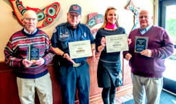 The Sequim-Dungeness Valley Chamber of Commerce honored four citizens during a luncheon at Cedars at Dungeness Golf Course. Volunteer events photographer Ron Stecker, left, was named Citizen and the Year and philanthropist George Brown, right, was presented the Bill & Esther Littlejohn Humanitarian Award. Clallam County Fire District 3 volunteer Blaine Zechenelly, second from left, and Sequim Wheelers founder Nicole Lepping, second from right, were among the Citizen of the Year finalists. (Emily Matthiessen/Olympic Peninsula News Group)