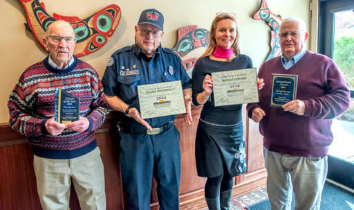 The Sequim-Dungeness Valley Chamber of Commerce honored four citizens during a luncheon at Cedars at Dungeness Golf Course. Volunteer events photographer Ron Stecker, left, was named Citizen and the Year and philanthropist George Brown, right, was presented the Bill & Esther Littlejohn Humanitarian Award. Clallam County Fire District 3 volunteer Blaine Zechenelly, second from left, and Sequim Wheelers founder Nicole Lepping, second from right, were among the Citizen of the Year finalists. (Emily Matthiessen/Olympic Peninsula News Group)