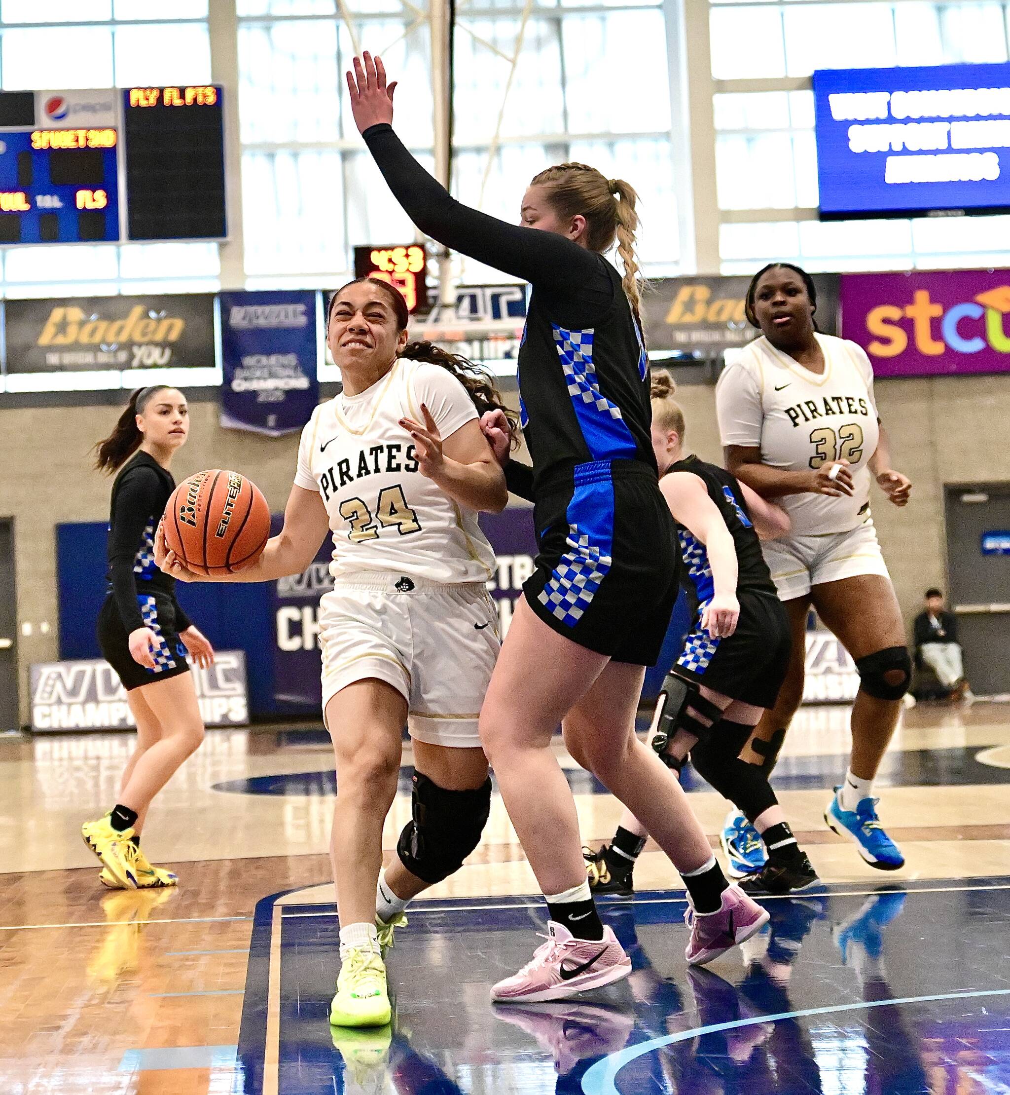 Jay Cline/Peninsula College Athletics Peninsula College’s Shania Moananu drives against the South Puget Sound defense during the Pirates’ NWAC Women’s Basketball Tournament Elite 8 victory Thursday at Columbia Basin College in Pasco.