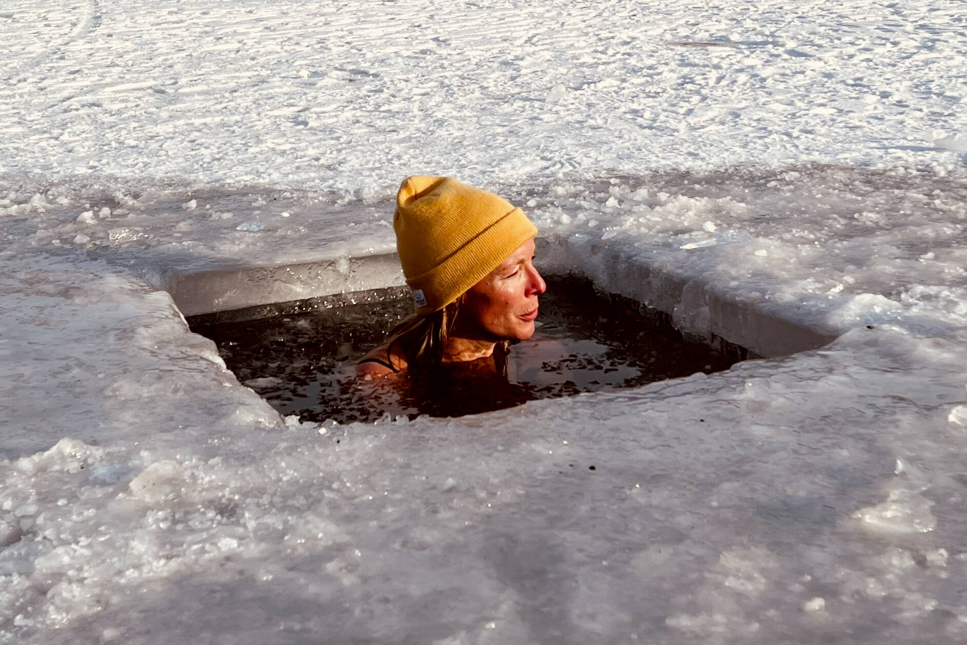 Karyn Stillwell cold plunging in Alaska. (Karyn Stillwell)