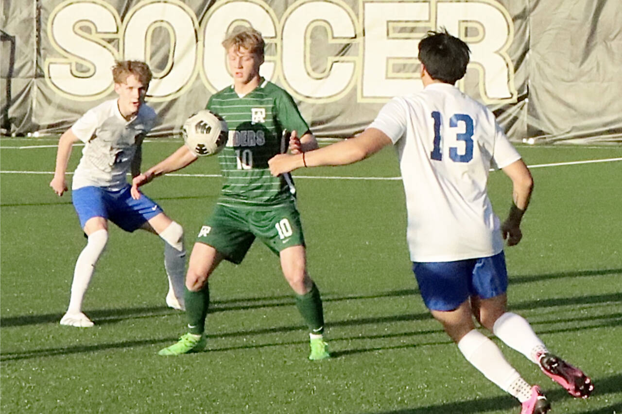 Port Angeles' Matthew Miller settles the ball against Bremerton on Tuesday at Wally Sigmar Field in Port Angeles. Miller scored a hat trick, his third of the season, as the Roughriders won 4-0 to lock up third place in the Olympic League. Port Angeles will host a district playoff game Saturday. (Dave Logan/for Peninsula Daily News)