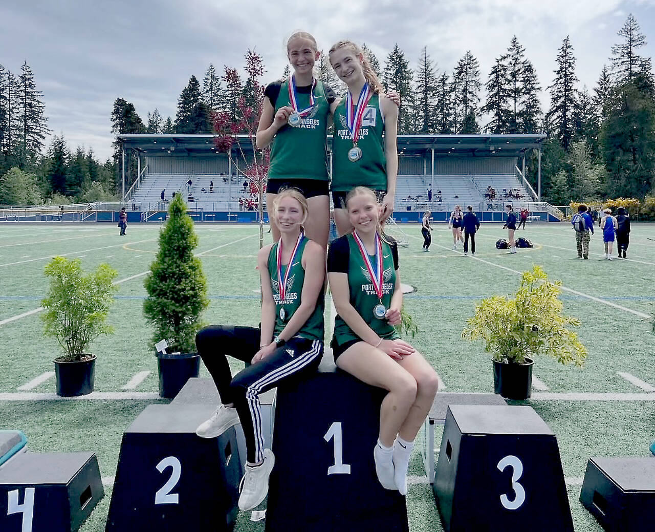 The Port Angeles girls 4x400 team took first place at the Olympic League track and field championships this weekend held in Belfair. From left to right, top are Storey Schmidt and Faerin Tait. From left to right bottom are Leia Larson and Brooke Pierce. (Courtesy of Casey McDonald)