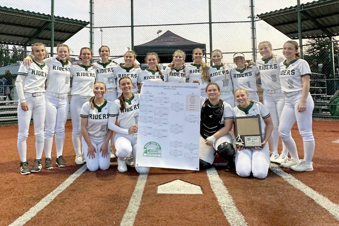 The Port Angeles softball team celebrates winning the District 3 2A tournament Saturday in Lacey. The Roughriders won by beating North Kitsap 8-1 and Olympic 8-0. (Morgan Worthington)