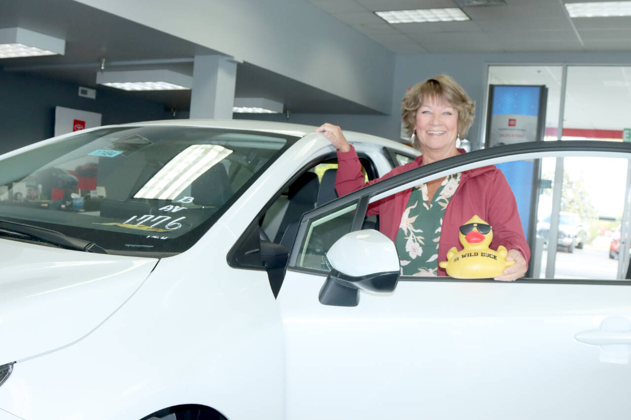 Colleen Williams of Port Angeles won a Toyota Corolla donated by Wilder Toyota in the 36th annual Great Olympic Peninsula Duck Derby. She said Tuesday she was shocked when Bruce Skinner, the executive director of the Olympic Medical Center Foundation, called her Sunday to tell her she won. “All I could say is, ‘You’re kidding me. What?” Williams said. (Dave Logan/for Peninsula Daily News)