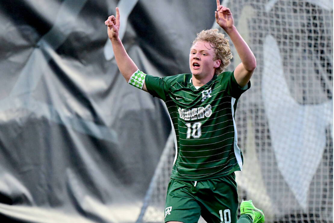 Port Angeles' Matthew Miller celebrates one of his 22 goals this season for the Roughriders. (Jay Cline)