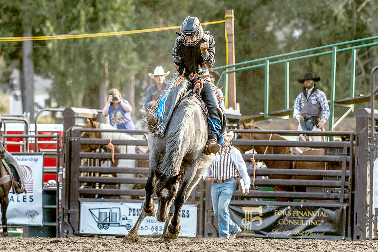 Conner Mead in the Bareback competition at last year’s Peninsula Junior Rodeo at Clallam County Fairgrounds. In July, he will compete in the event at the National High School Rodeo Finals. (Photo by Emma Lou)