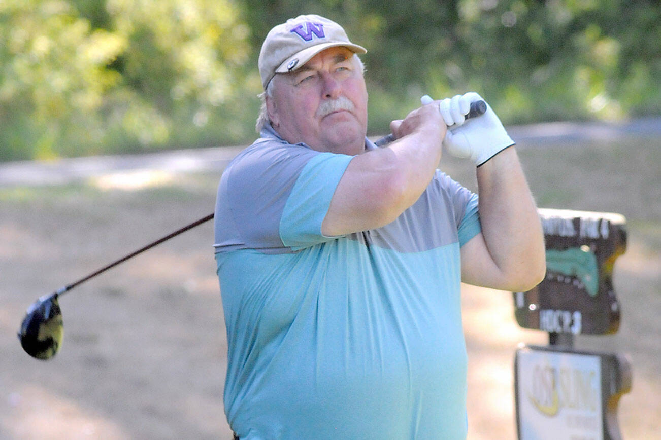 KEITH THORPE/PENINSULA DAILY NEWS
Brian Sleight of SeaTac tees off during the first round of the Clallam County Amateur at Peninsula Golf Club on Friday. The tournament continues today and will wrap Sunday at The Cedars at Dungeness Golf Course in Sequim.