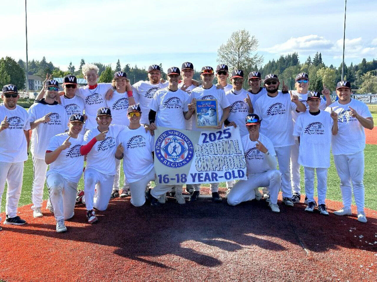 The Wilder Senior Baseball Club celebrates winning the Pacific Northwest Babe Ruth 16-18 tournament in Kelso on Sunday. The senior qualified to play in the Babe Ruth World Series in Florida. (Courtesy of Zac Moore)
