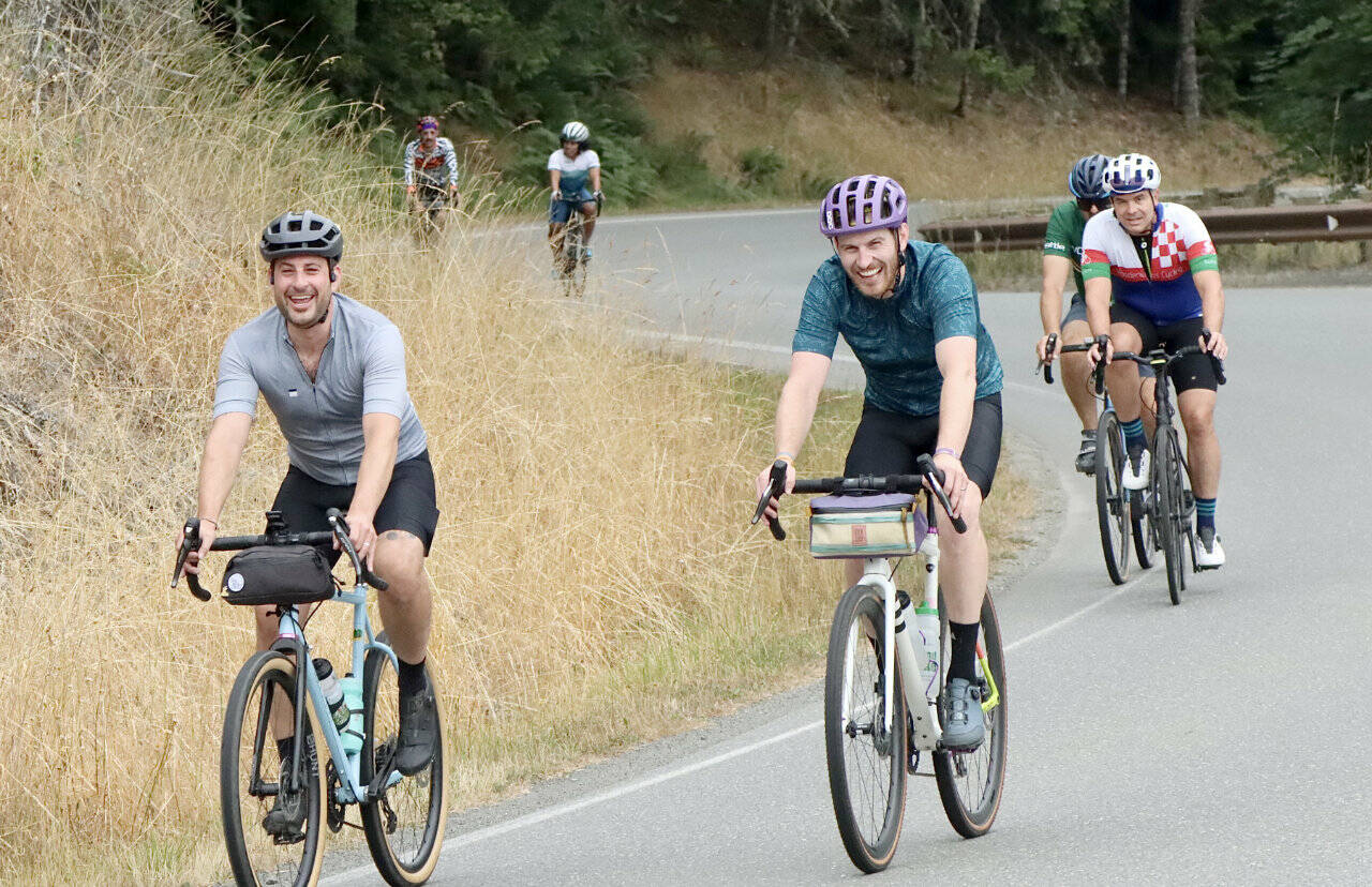 About 800 cyclists took on the annual Ride the Hurricane event Sunday, making the 40-mile round-trip that climbs more than 5,000 feet from Port Angeles to Hurricane Ridge. (Dave Logan/for Peninsula Daily News)
