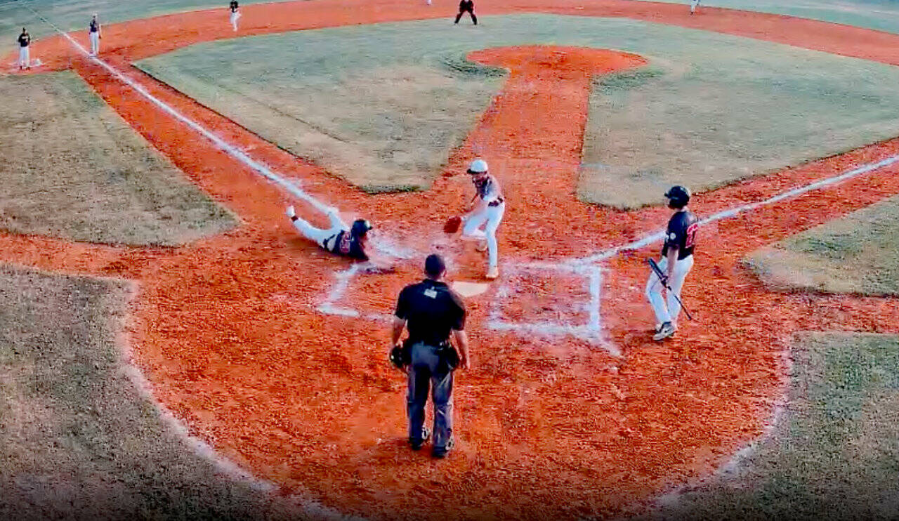 Wilder Senior’s Jordan Shumway slides home to score a run in the second inning after a wild pitch against Mid-County, Texas on Monday. Mid-County won 15-3. (Gamechanger)