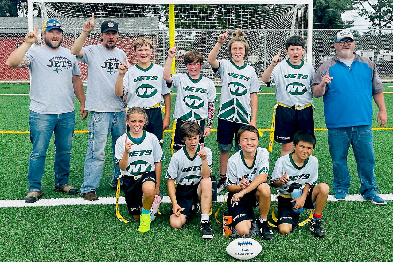 The Joyce Jets 11U champion flag football team. From left, back row, are coach Lukas Cox, coach Ryan Sage, Thomas Dalgardno, Desmond Sprague, Rebel Shea, Noah Murphie and coach Brian Shimko. From left, front row, are Emma Lee, Darren Heward, Koltyn White and William Goldman. (Sam Kneiss)
