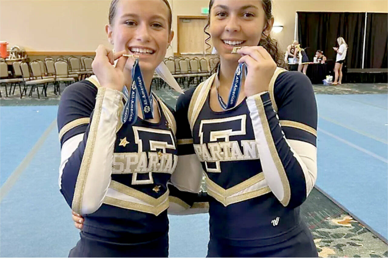 Forks cheerleaders Libby Owen and Danikka King have to been selected to perform at the Pearl Harbor Memorial Parade in Oahu in December and are raising funds for the trip.