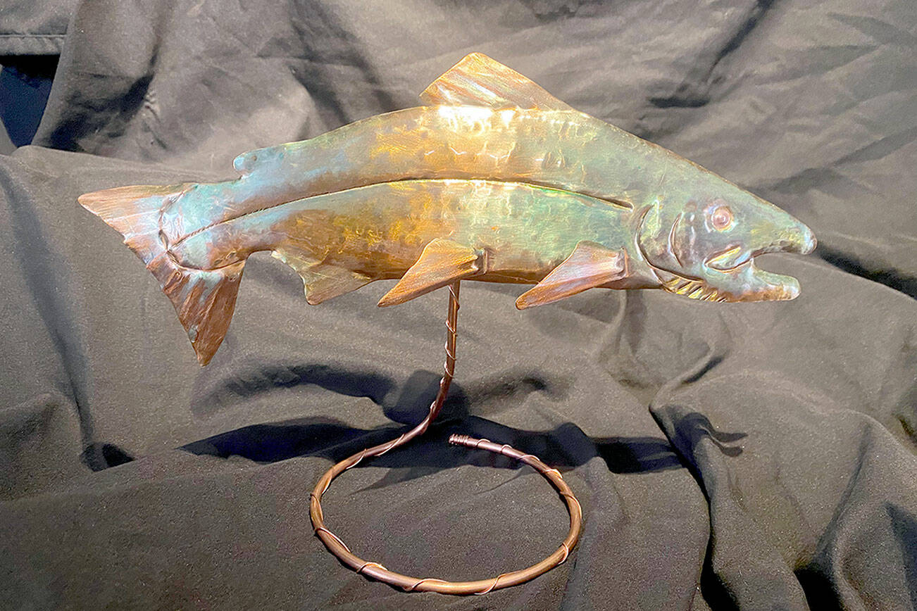 This 12-inch painted copper salmon table piece will be raffled off during the Second Saturday Art Walk in Port Angeles this weekend.