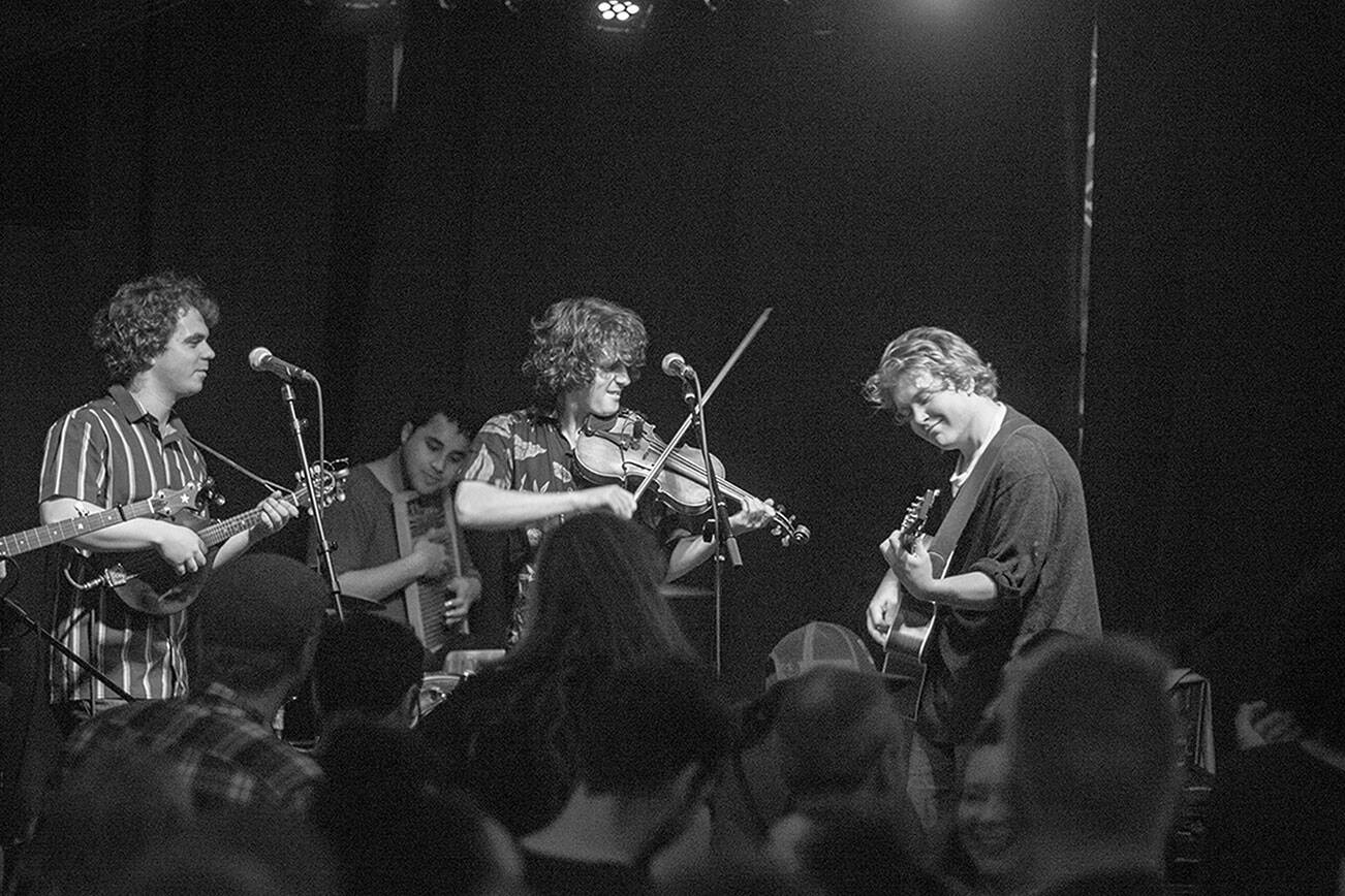 From left to right, Collin McAvinchey, Adam Amr, Joey Gish and Will Jevne of Sweater Weather Stringband will host Olympickin' at the Quilcene Lantern on Saturday.