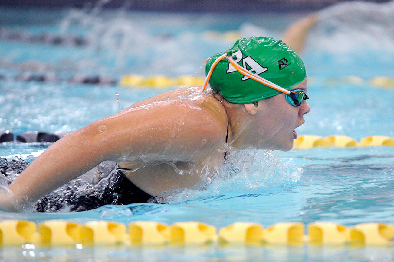 Michael Dashiell/Olympic Peninsula News Group
Port Angeles' Amaya Nelson earned a new personal best-time while swimming to a second-place finish in the 100-yard butterfly during an Olympic League swim meet with Sequim on Wednesday at the YMCA of Sequim.